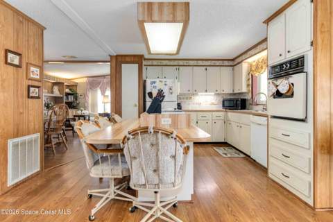 703 Amaryllis Drive, Barefoot Bay FL - photo 10 of 28