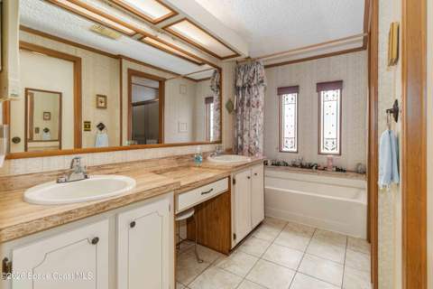 703 Amaryllis Drive, Barefoot Bay FL - photo 15 of 28
