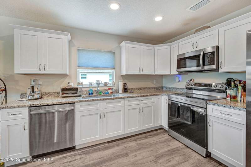3 bedroom Single Family Residence at 1689 Colorado Street, Port Malabar Unit 18, Palm Bay — photo 4