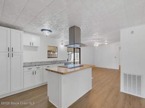 908 Oleander Circle, Barefoot Bay FL - photo 7 of 36