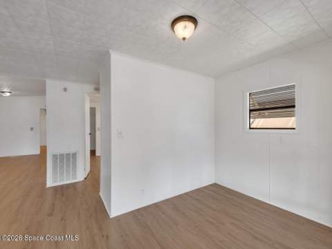 908 Oleander Circle, Barefoot Bay FL - photo 8 of 36