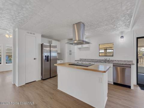 908 Oleander Circle, Barefoot Bay FL - photo 9 of 36