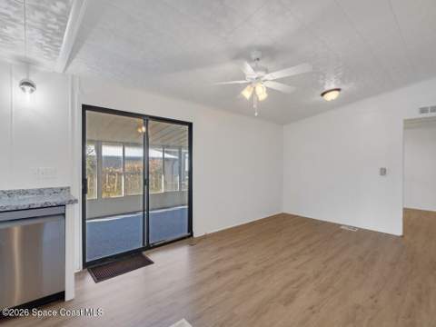 908 Oleander Circle, Barefoot Bay FL - photo 10 of 36