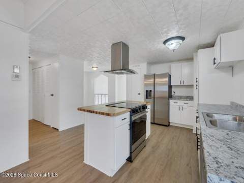 908 Oleander Circle, Barefoot Bay FL - photo 12 of 36