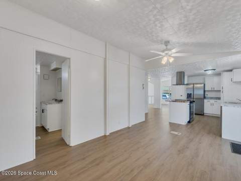 908 Oleander Circle, Barefoot Bay FL - photo 13 of 36