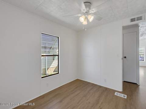 908 Oleander Circle, Barefoot Bay FL - photo 16 of 36