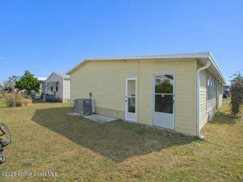 908 Oleander Circle, Barefoot Bay FL - photo 24 of 36