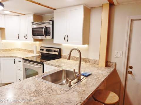 1328 Turkey Creek Drive, Palm Bay FL - photo 10 of 35