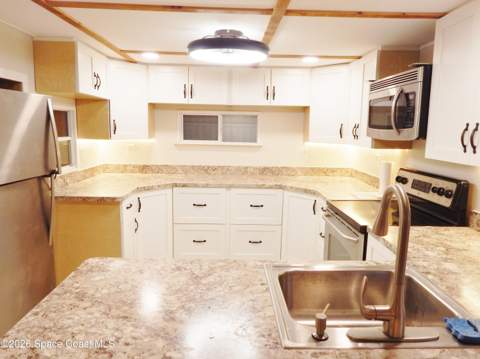 1328 Turkey Creek Drive, Palm Bay FL - photo 9 of 35