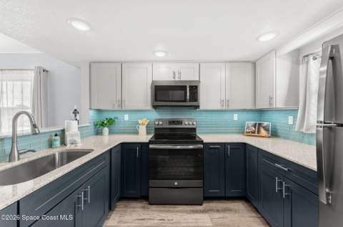 7301 Ridgewood Avenue #A103, Cape Canaveral FL - photo 10 of 55