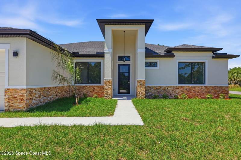 4 bedroom Single Family Residence at 889 Reading Street, Port Malabar Unit 24, Palm Bay — photo 3