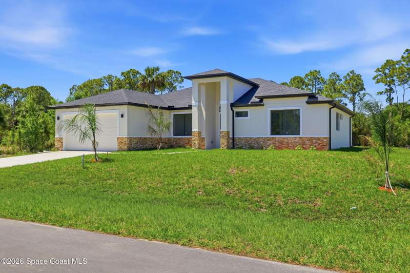 4 bedroom Single Family Residence at 889 Reading Street, Port Malabar Unit 24, Palm Bay — photo 4