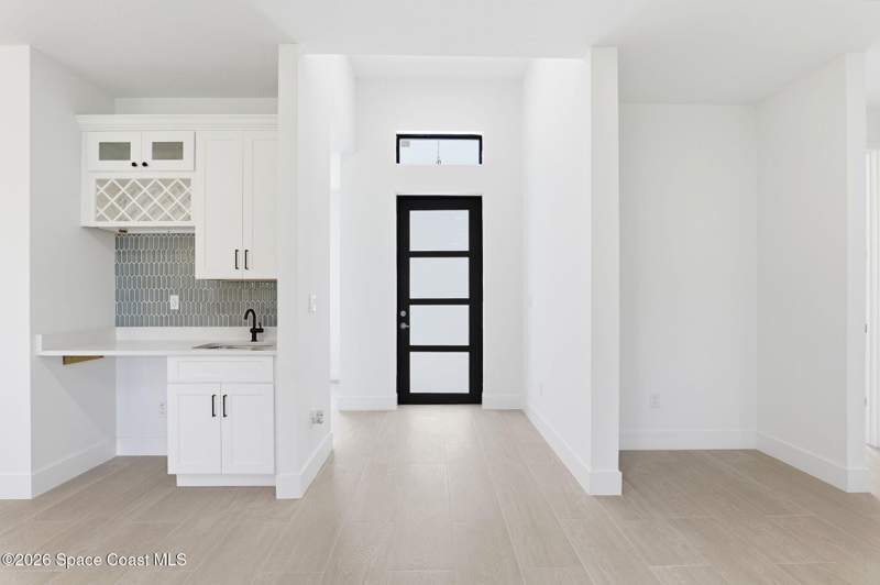 4 bedroom Single Family Residence at 889 Reading Street, Port Malabar Unit 24, Palm Bay — photo 5
