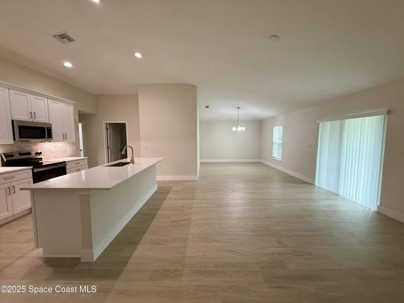 4 bedroom Single Family Residence at 581 Toynbee Road, Port Malabar Unit 20, Palm Bay — photo 4