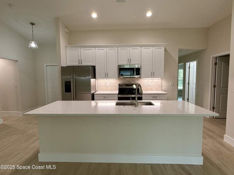 4 bedroom Single Family Residence at 581 Toynbee Road, Port Malabar Unit 20, Palm Bay — photo 5