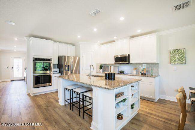 4 bedroom Single Family Residence at 598 Oldenberg Street, Port Malabar Unit 31, Palm Bay — photo 4