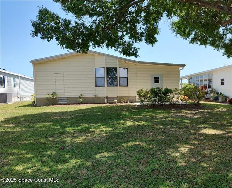 2 bedroom Manufactured Home at 451 Papaya Circle, Barefoot Bay Unit 1, Barefoot Bay — photo 3