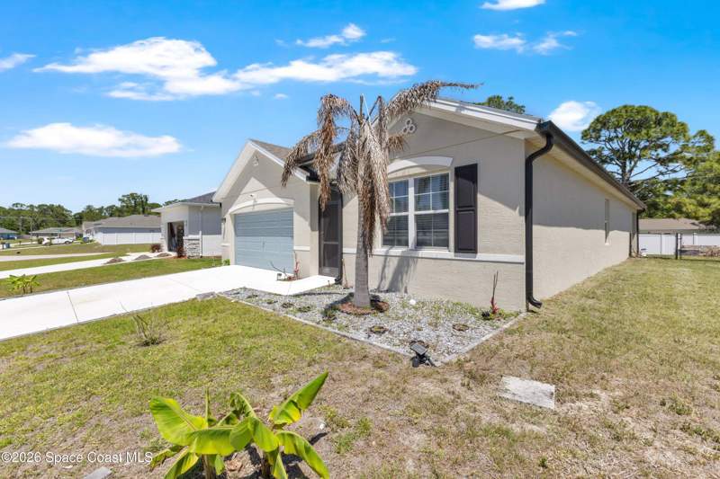 4 bedroom Single Family Residence at 941 Century Avenue, Port Malabar Unit 12, Palm Bay — photo 2
