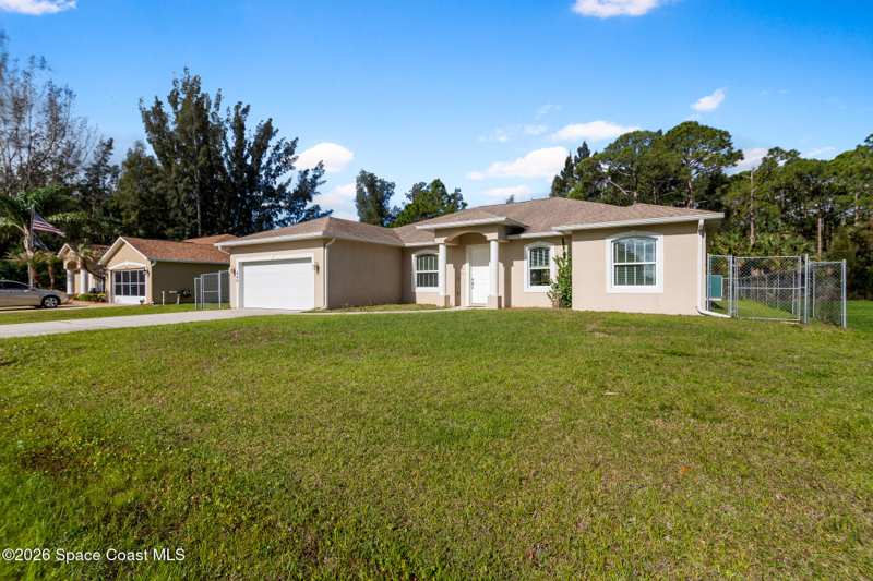 4 bedroom Single Family Residence at 486 Avocado Road, Port Malabar Unit 13, Palm Bay — photo 1