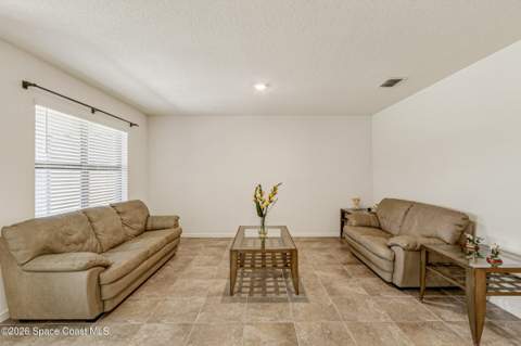 1003 Remington Green Drive, Palm Bay FL - photo 7 of 42