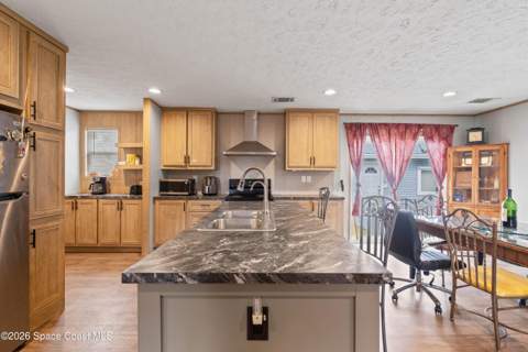 958 Pecan Circle, Barefoot Bay FL - photo 8 of 24