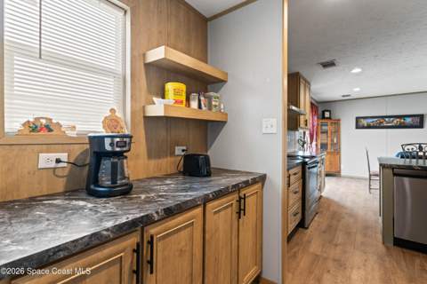 958 Pecan Circle, Barefoot Bay FL - photo 11 of 24