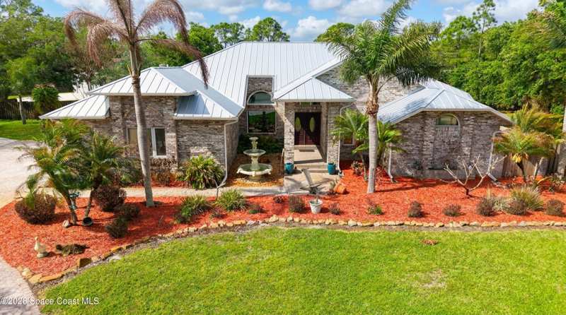 5 bedroom Single Family Residence at 1711 Flamevine Place, Bear Creek, Malabar — photo 1