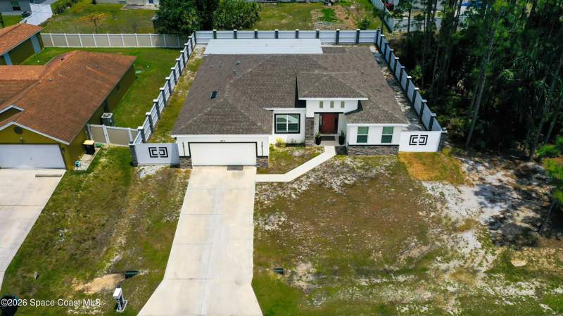 4 bedroom Single Family Residence at 457 Tillman Avenue, Port Malabar Unit 20, Palm Bay — photo 4