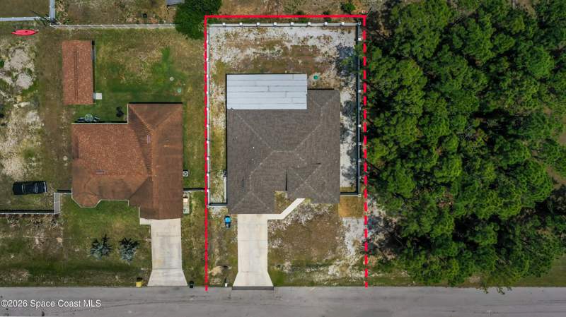4 bedroom Single Family Residence at 457 Tillman Avenue, Port Malabar Unit 20, Palm Bay — photo 5