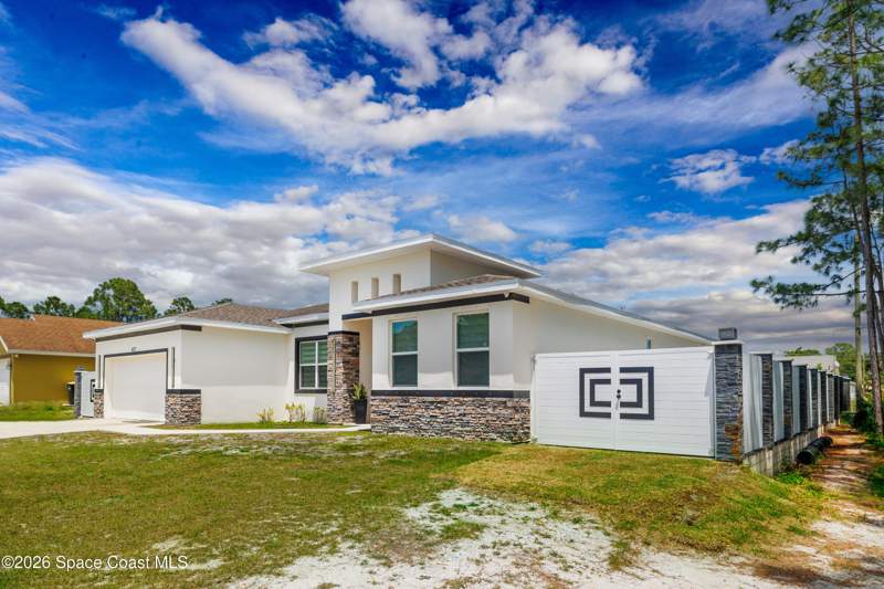 4 bedroom Single Family Residence at 457 Tillman Avenue, Port Malabar Unit 20, Palm Bay — photo 3