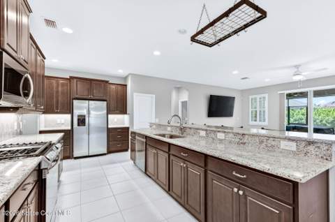 7945 Millbrook Avenue, Melbourne FL - photo 11 of 102