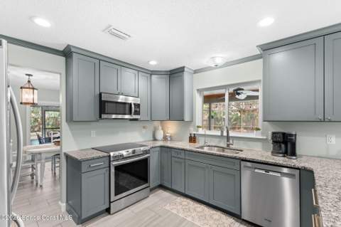 1140 Two Oaks Boulevard, Merritt Island FL - photo 7 of 63