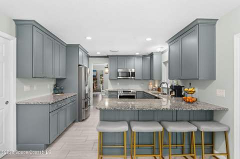 1140 Two Oaks Boulevard, Merritt Island FL - photo 9 of 63