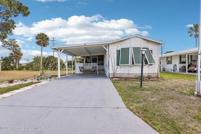 2 bedroom Mobile Home at 513 S Egret Circle, Barefoot Bay Unit 2 Part 13, Barefoot Bay — photo 1