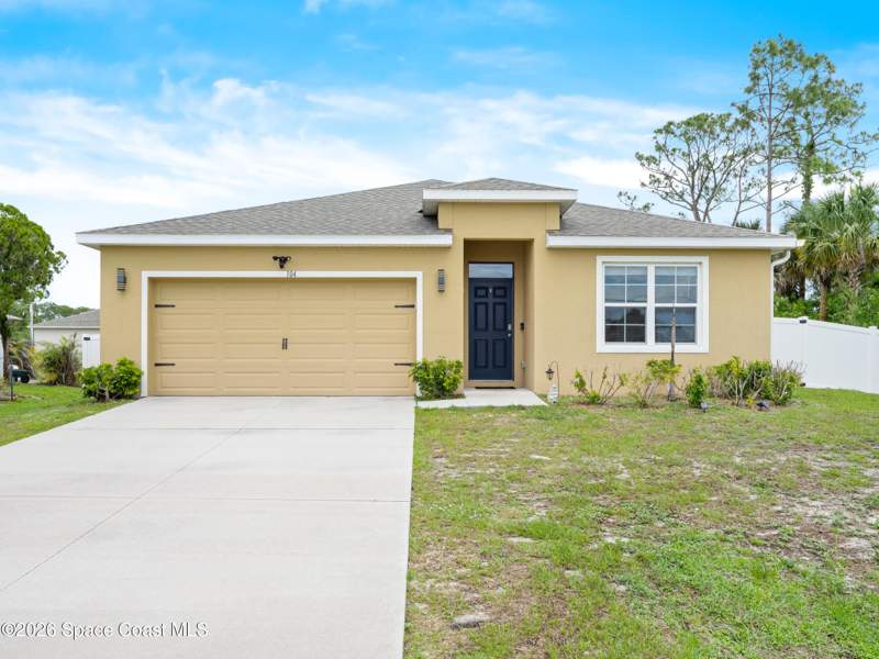 4 bedroom Single Family Residence at 104 Carmelite Avenue, Port Malabar Unit 14, Palm Bay — photo 2