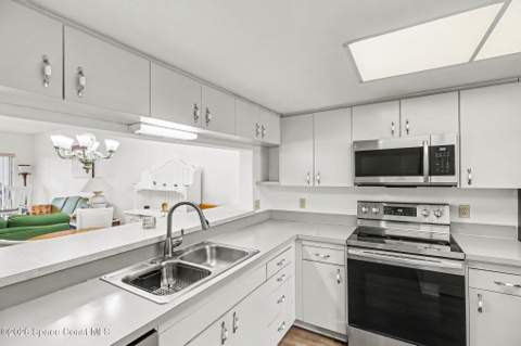 3613 S Banana River Boulevard #D506, Cocoa Beach FL - photo 6 of 38