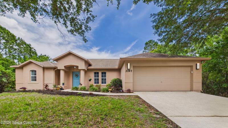 4 bedroom Single Family Residence at 3147 Winchester Avenue, Port Malabar Unit 24, Palm Bay — photo 2