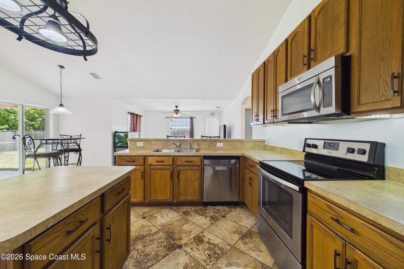 4 bedroom Single Family Residence at 3147 Winchester Avenue, Port Malabar Unit 24, Palm Bay — photo 4