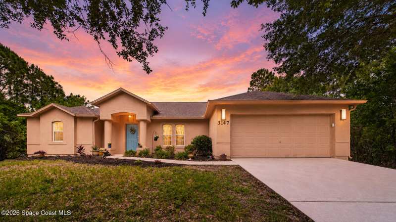4 bedroom Single Family Residence at 3147 Winchester Avenue, Port Malabar Unit 24, Palm Bay — photo 1