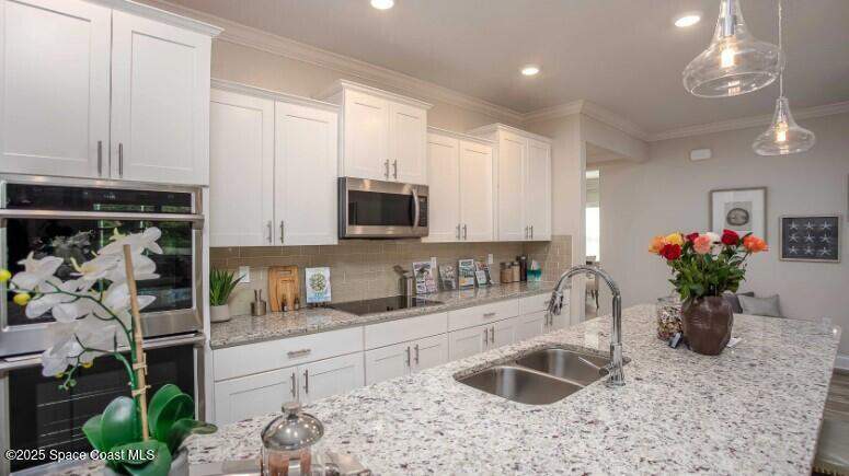 4 bedroom Single Family Residence at 1128 Altair Way, Eagle Crest, Grant-Valkaria — photo 3