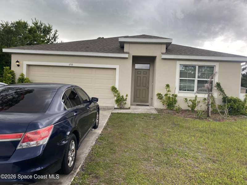 4 bedroom Single Family Residence at 698 San Filippo Drive #698 San Filippo Drive, Port Malabar Unit 16, Palm Bay — photo 1