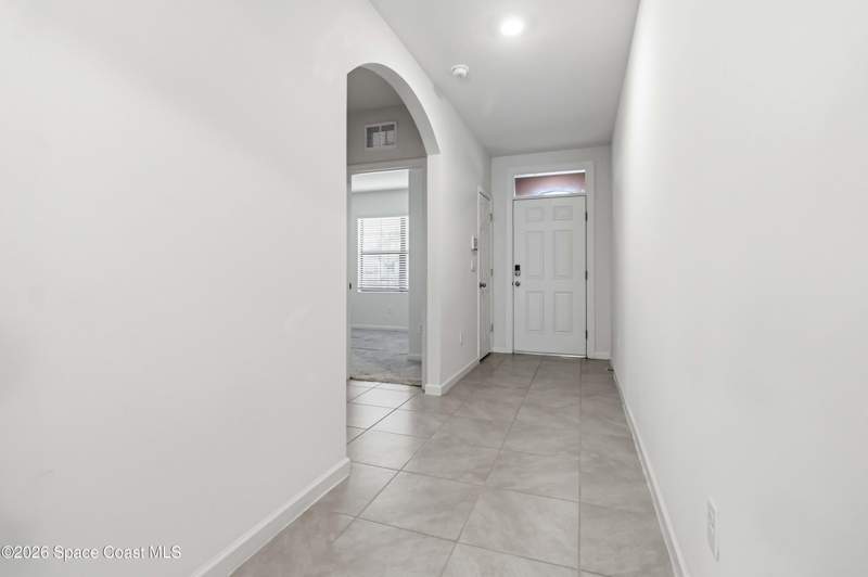 4 bedroom Single Family Residence at 939 Remington Green Drive, Preserves at Stonebriar Phase 1, Palm Bay — photo 2