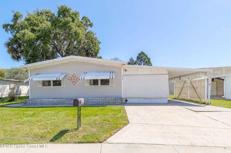 2 bedroom Manufactured Home at 320 Holiday Park Boulevard, Port Malabar Holiday Park Unit 1 1st Replat, Palm Bay — photo 2