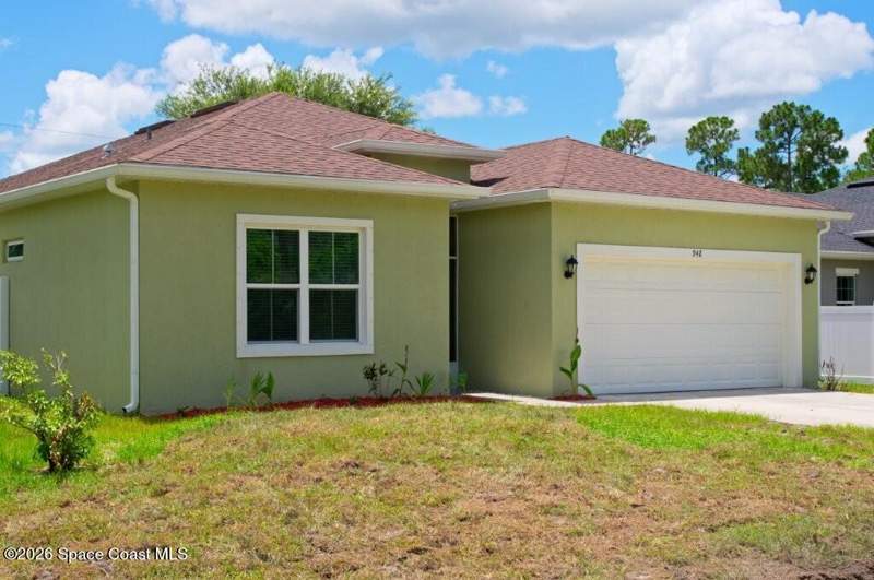 4 bedroom Single Family Residence at 948 Wheatley Street, Port Malabar Unit 23, Palm Bay — photo 2