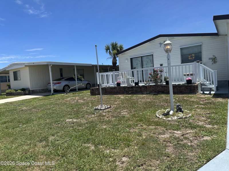 2 bedroom Manufactured Home at 515 Royal Tern Drive, Barefoot Bay Unit 2 Part 13, Barefoot Bay — photo 1
