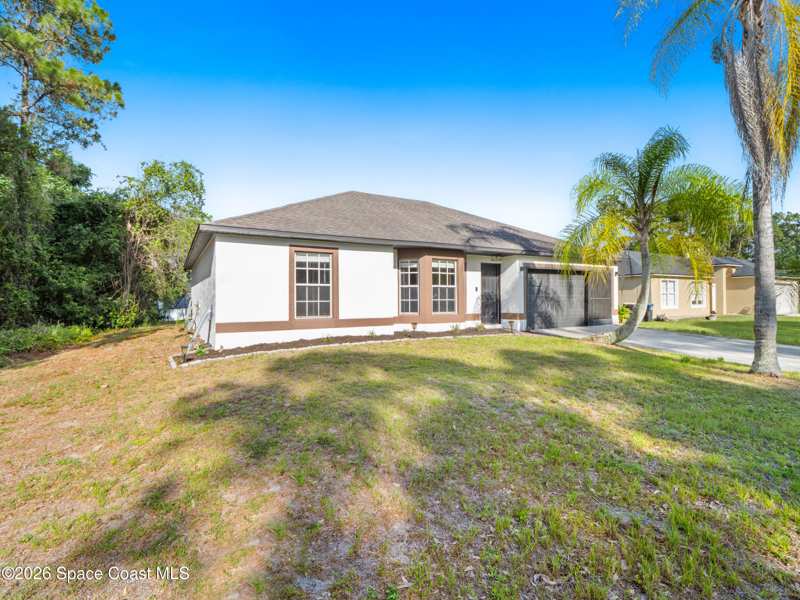 3 bedroom Single Family Residence at 3291 Forghun Avenue, Port Malabar Unit 25, Palm Bay — photo 1