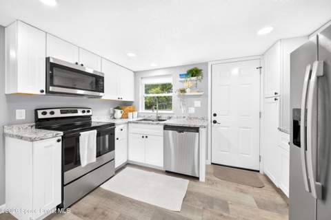 3448 Populatic Street, Mims FL - photo 11 of 34