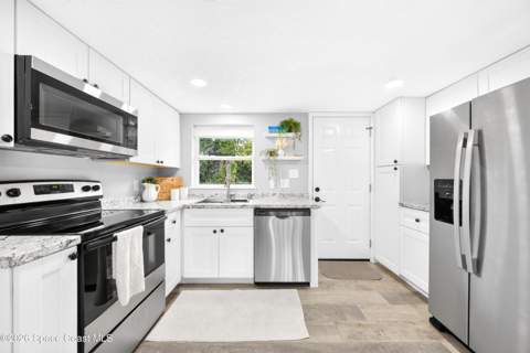 3448 Populatic Street, Mims FL - photo 9 of 34