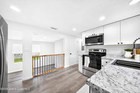 3448 Populatic Street, Mims FL - photo 13 of 34