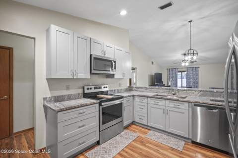 1416 Club Gardens Drive, Palm Bay FL - photo 8 of 29
